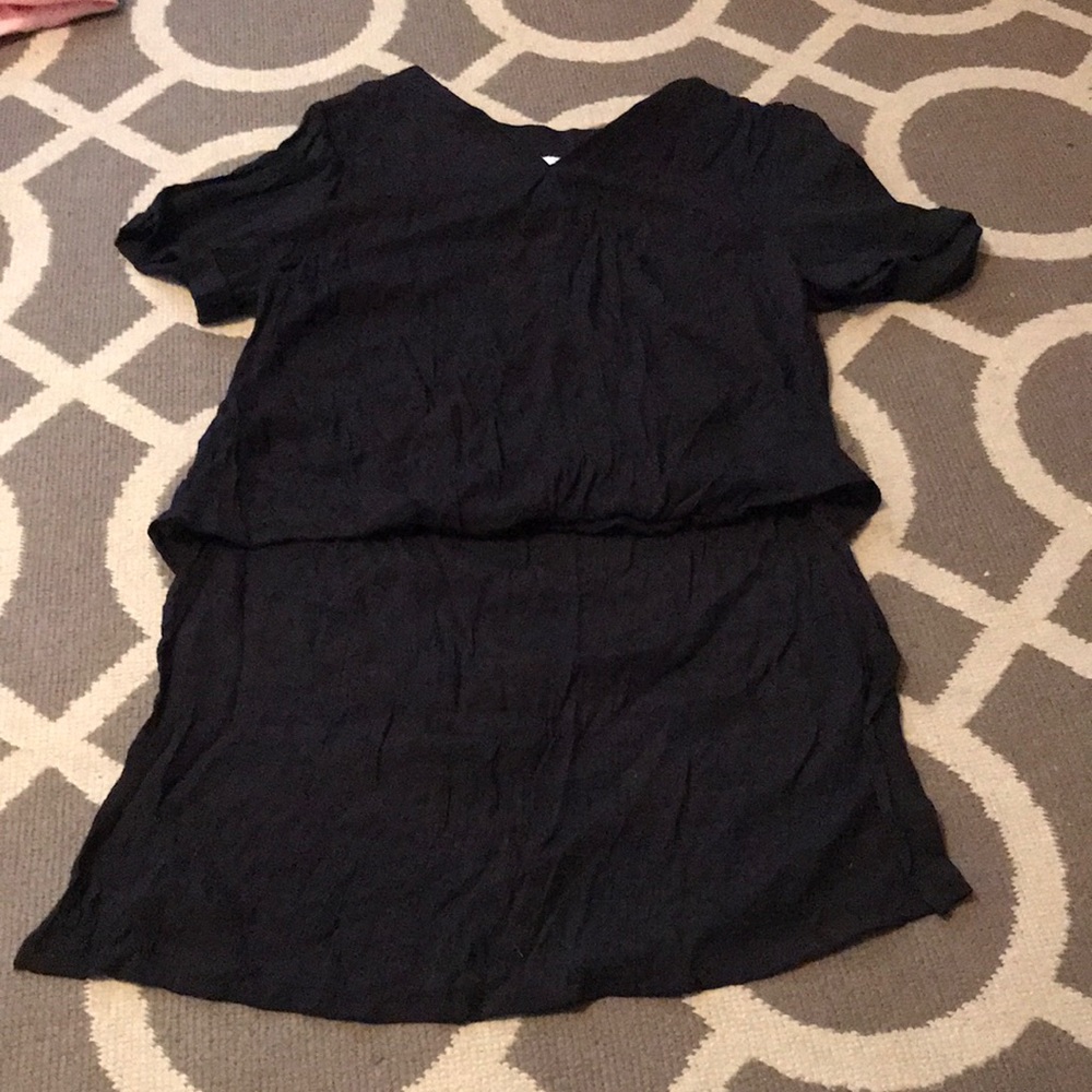 black catos shirt, short in the from long in the back